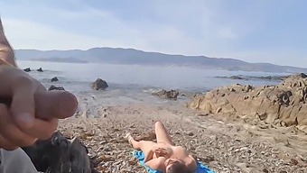 A Daring Man Exposes His Genitals To A Nudist Mother At The Beach, Who Proceeds To Perform Oral Sex On Him